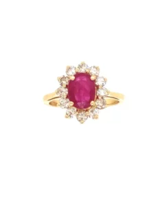 princess diana set ruby and diamond ring in 18 karat yellow gold.
