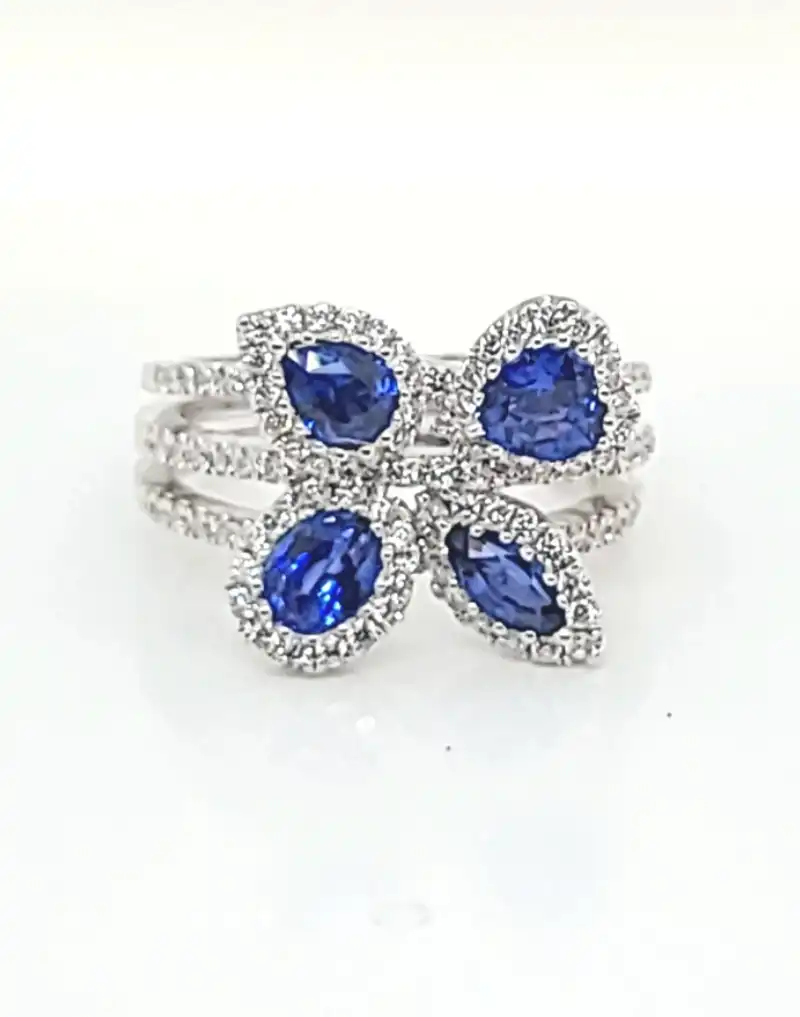 white gold and blue sapphire ring