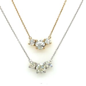 3-stone diamond necklaces in yellow gold and white gold